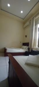 Voodi või voodid majutusasutuse Five Hostel toas
