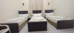 Voodi või voodid majutusasutuse Five Hostel toas