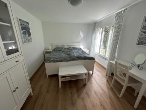 Ένα ή περισσότερα κρεβάτια σε δωμάτιο στο Apartment Oberbergstrasse 91b by Interhome