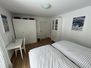 Ένα ή περισσότερα κρεβάτια σε δωμάτιο στο Apartment Oberbergstrasse 91b by Interhome +15 φωτογραφίες