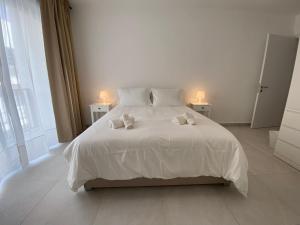 Letto o letti in una camera di Swieqi Malaika New Apt 3
