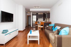 TV a/nebo společenská místnost v ubytování Corralejo Main Street Apartment