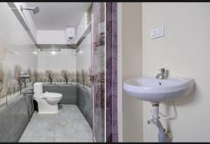 Koupelna v ubytování Hotel RK Grand + 7 fotografií