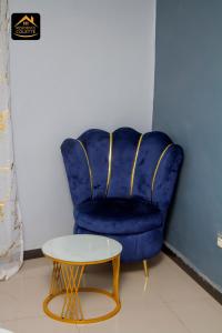 Posezení v ubytování Chambre privée à Bafoussam Diengdam proche agence BlueBird