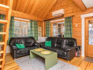 Posezení v ubytování Holiday Home Loimu by Interhome
