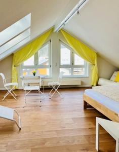 Ένα ή περισσότερα κρεβάτια σε δωμάτιο στο Sieben Tannen Titisee