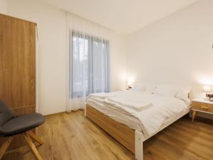 Ένα ή περισσότερα κρεβάτια σε δωμάτιο στο Holiday Home Daniel by Interhome