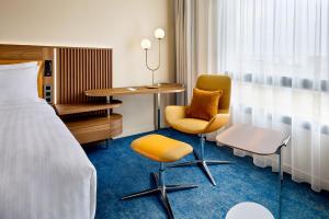 Posezení v ubytování Courtyard by Marriott Lyon Eurexpo Stadium