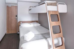 Postel nebo postele na pokoji v ubytování SUN1 PORT ELIZABETH
