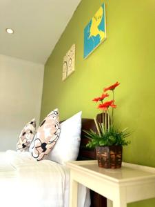 Postel nebo postele na pokoji v ubytování Sea Boss Homestay