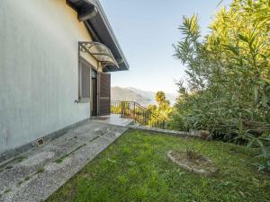 an open door of a house with a yard at Holiday Home Marzia by Interhome in Germignaga
