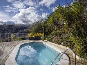 a swimming pool with a view of the mountains at Villa Villa Bellevue by Interhome in Saint Paul de Vence