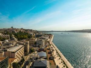 an aerial view of a city next to the water at Novotel Istanbul Bosphorus Hotel in Istanbul