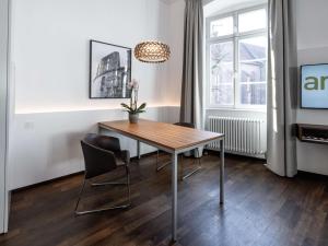 TV a/nebo společenská místnost v ubytování Arthotel Heidelberg