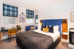 Postel nebo postele na pokoji v ubytování The Berkeley Square Hotel Bristol