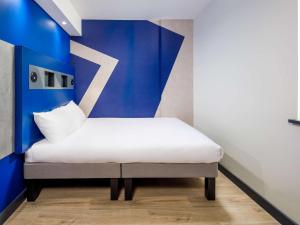 ibis budget Manchester Airport T2客房内的一张或多张床位
