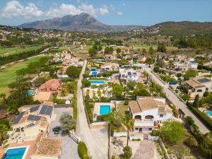 an aerial view of a residential neighborhood with houses at VILLA HERBEN JAVEA - Golf Club Jávea in Jávea