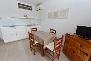 Kuchyň nebo kuchyňský kout v ubytování Copacabana 12