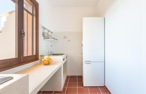 Η κουζίνα ή μικρή κουζίνα στο Casa del Lentischio +11 φωτογραφίες