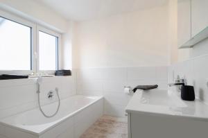 Ένα μπάνιο στο Ferienhaus Aura +58 φωτογραφίες