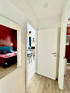 a room with a bedroom with a bed and a table at Milano Duomo Design Apartment in Milan