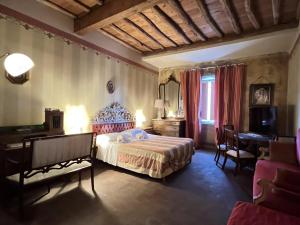 Postel nebo postele na pokoji v ubytování Al Tuscany