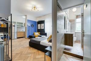 Giường trong phòng chung tại Ferravilla Apt, 2 min to subway!