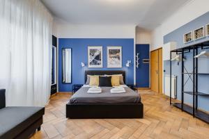 Giường trong phòng chung tại Ferravilla Apt, 2 min to subway!