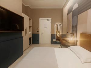 A bed or beds in a room at The B Place