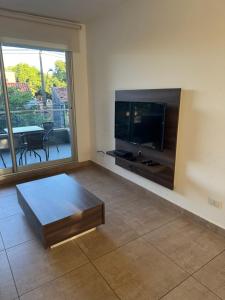TV a/nebo společenská místnost v ubytování Edifício Wish