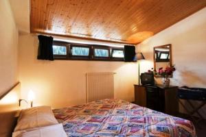 Postel nebo postele na pokoji v ubytování Hotel Canin