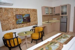 A kitchen or kitchenette at The Hague Maitama