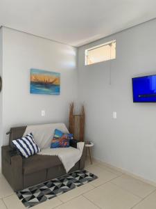 Μια τηλεόραση ή/και κέντρο ψυχαγωγίας στο Loft Pé na Areia - Praia do Ervino