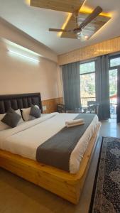 Postel nebo postele na pokoji v ubytování Hotel Cloud Height