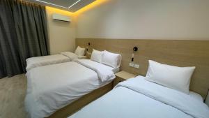 Letto o letti in una camera di Landmark Hostel Cairo