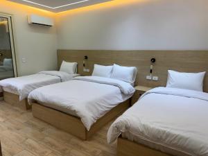 Letto o letti in una camera di Landmark Hostel Cairo
