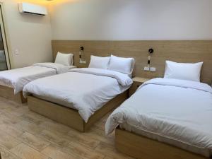 Letto o letti in una camera di Landmark Hostel Cairo