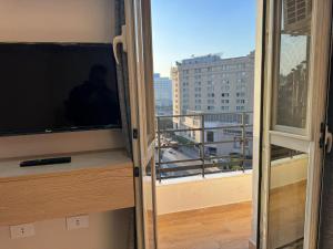 TV a/nebo společenská místnost v ubytování Landmark Hostel Cairo