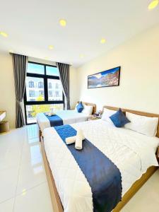 Postel nebo postele na pokoji v ubytování Hải Anh Homestay 1