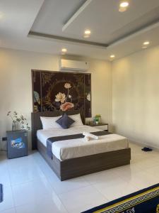 Postel nebo postele na pokoji v ubytování Hải Anh Homestay 1