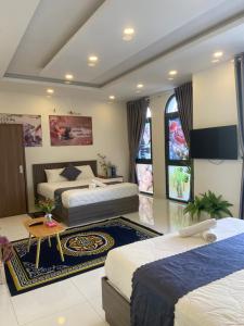 Postel nebo postele na pokoji v ubytování Hải Anh Homestay 1