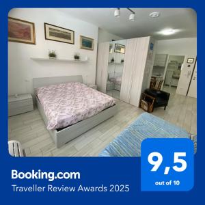 Łóżko lub łóżka w pokoju w obiekcie Appartamento House Apartment Tabe Centro Bologna