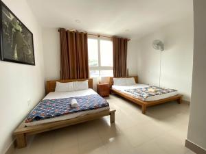 Postel nebo postele na pokoji v ubytování Family Heaven- Big Apartment, Big Fun!