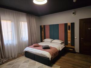 Postel nebo postele na pokoji v ubytování Hotel Yarus