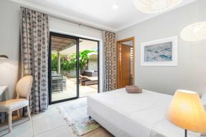 Кровать или кровати в номере Villa Sandpiper - Premium Stay in the North +28 фотографий