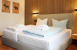 Postel nebo postele na pokoji v ubytování Hotel Simonis Koblenz