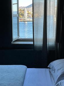 Postel nebo postele na pokoji v ubytování 1900 Hotel