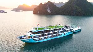 a cruise ship in a body of water at Dragon Premium Cruise Halong in Ha Long