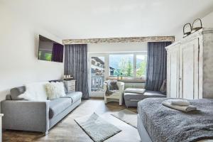 Posezení v ubytování Ferienwohnung Loferblick