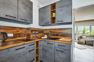 Kuchyň nebo kuchyňský kout v ubytování Ferienwohnung Loferblick